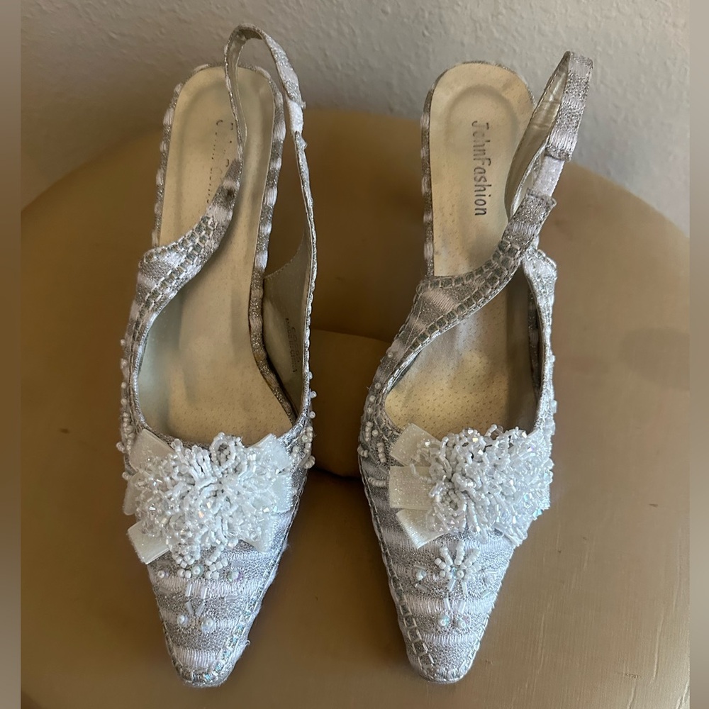 Size 9 white and silver metallic slingback 3’ heels with beading & sequined bow